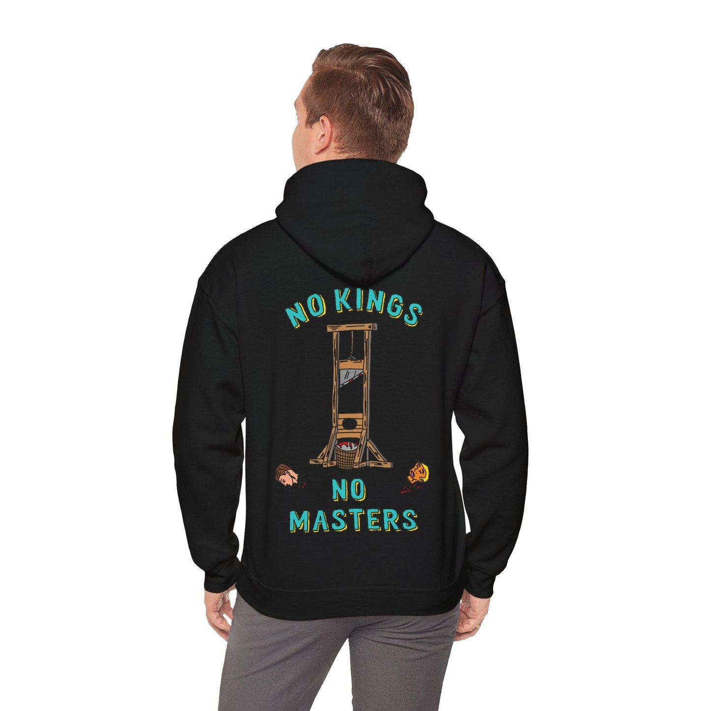 A person wears the No Kings No Masters Hoodie, featuring a back print of a guillotine with severed heads and the bold statement NO KINGS NO MASTERS, embodying a rebellious anti-authoritarian message.