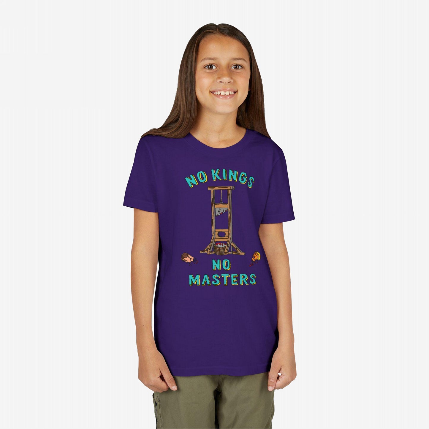 Young girl wearing the No Kings No Masters Shirt, featuring a cartoon-style guillotine and bold text, embodying anti-authoritarian defiance. Perfect for those challenging authority and supporting equality.