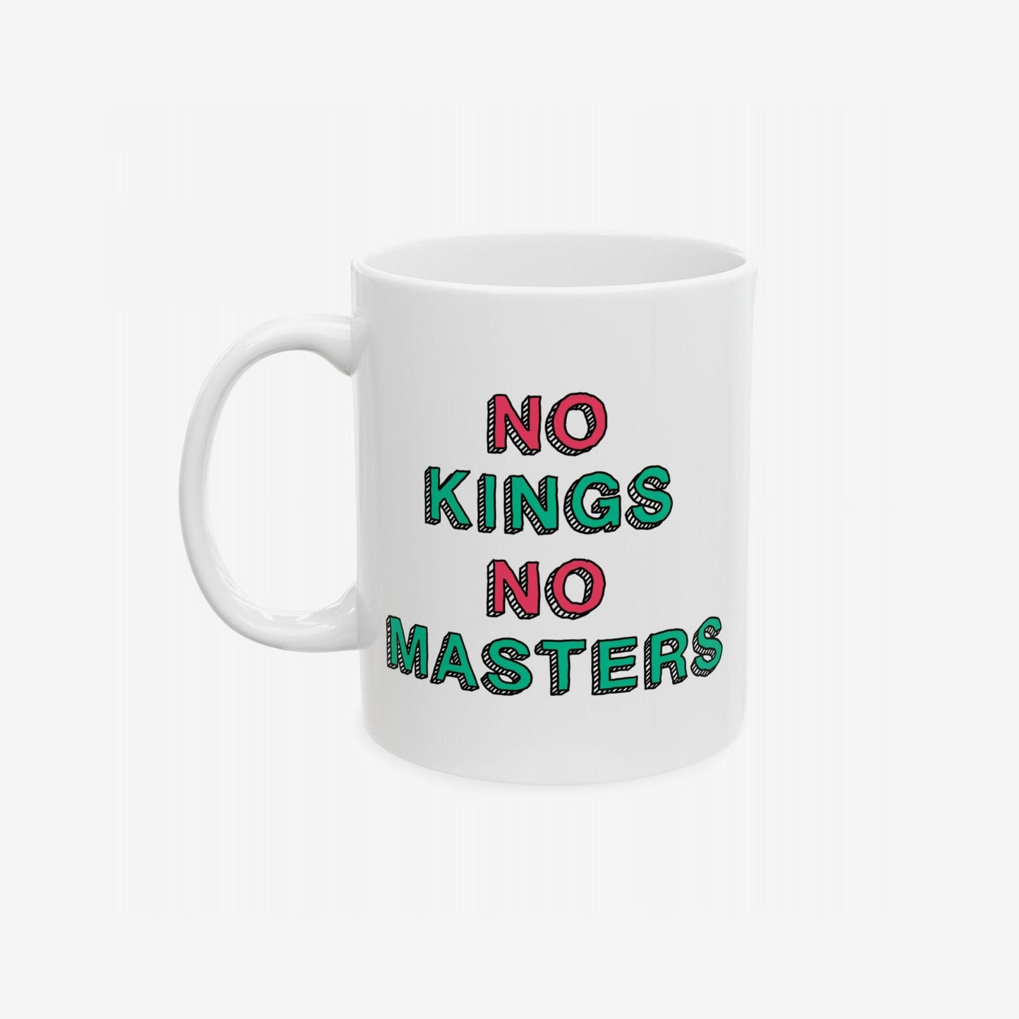 No Kings No Masters Mug features a bold slogan in red and green block letters on a white ceramic surface, embodying resistance and individuality with every sip. Ideal for anarchists and anti-capitalists.