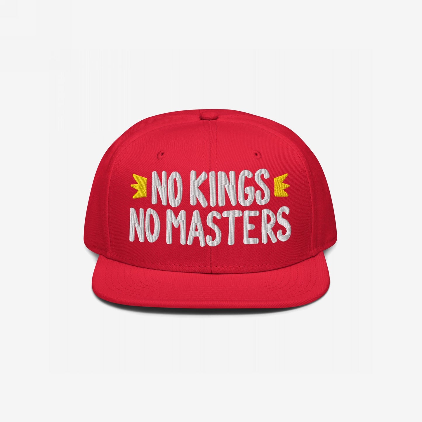 No Kings No Masters Hat: A red snapback baseball cap with bold white embroidery stating “NO KINGS NO MASTERS,” accented by yellow crown icons, symbolizing rebellion and individuality.