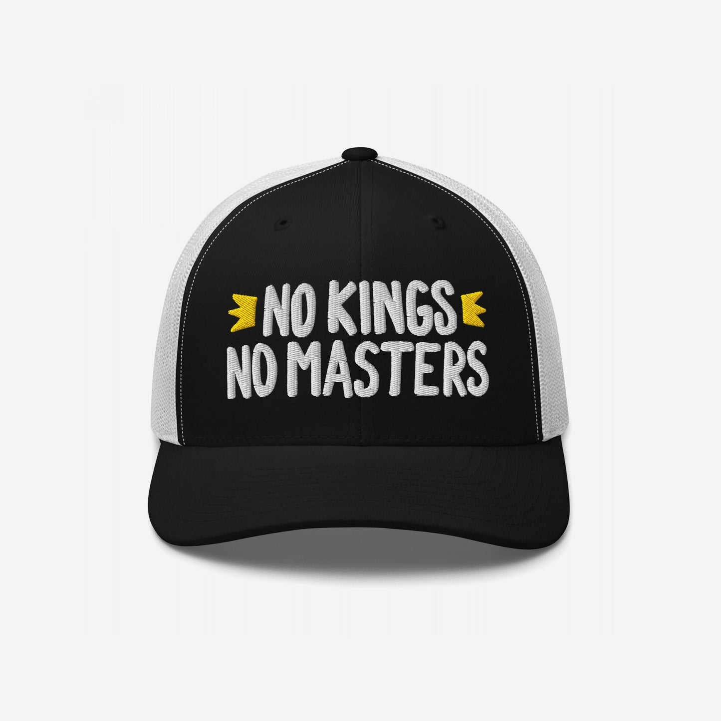 No Kings No Masters Hat with bold white embroidery and yellow accents on a black-and-white trucker cap, embodying rebellion and resistance.