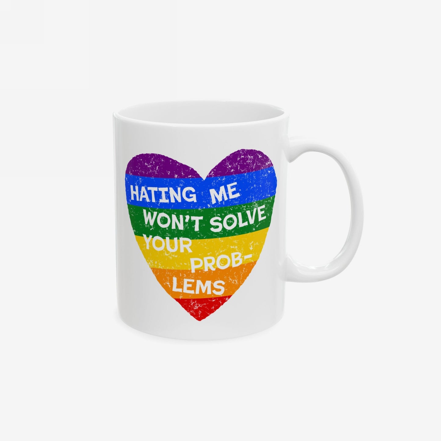 No LGBTQ Hate Mug featuring a distressed rainbow heart and bold message: “HATING ME WON’T SOLVE YOUR PROB-LEMS.” A vibrant statement piece supporting equality and LGBTQ+ pride.