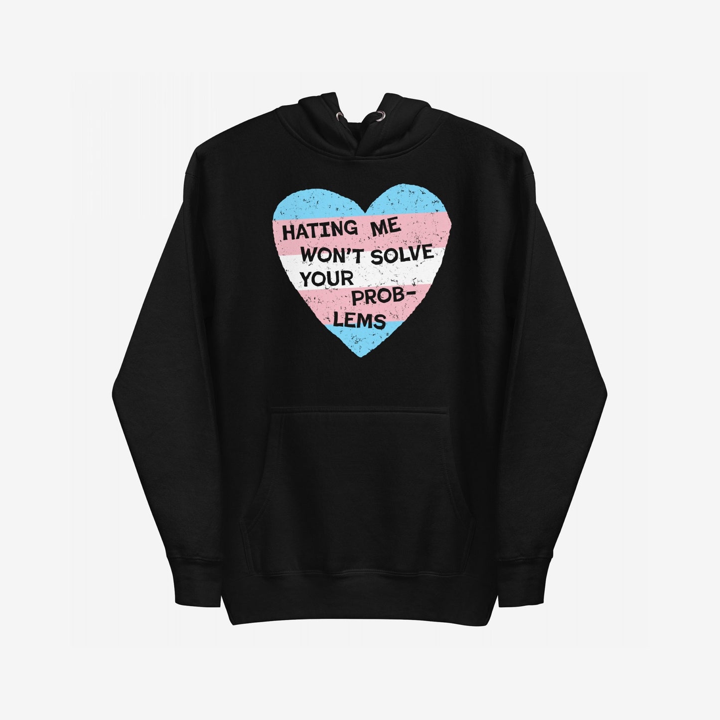 No Trans Hate Hoodie features a black pullover design with a large heart graphic in trans pride colors and the slogan “HATING ME WON’T SOLVE YOUR PROBLEMS,” embodying resilience and solidarity.