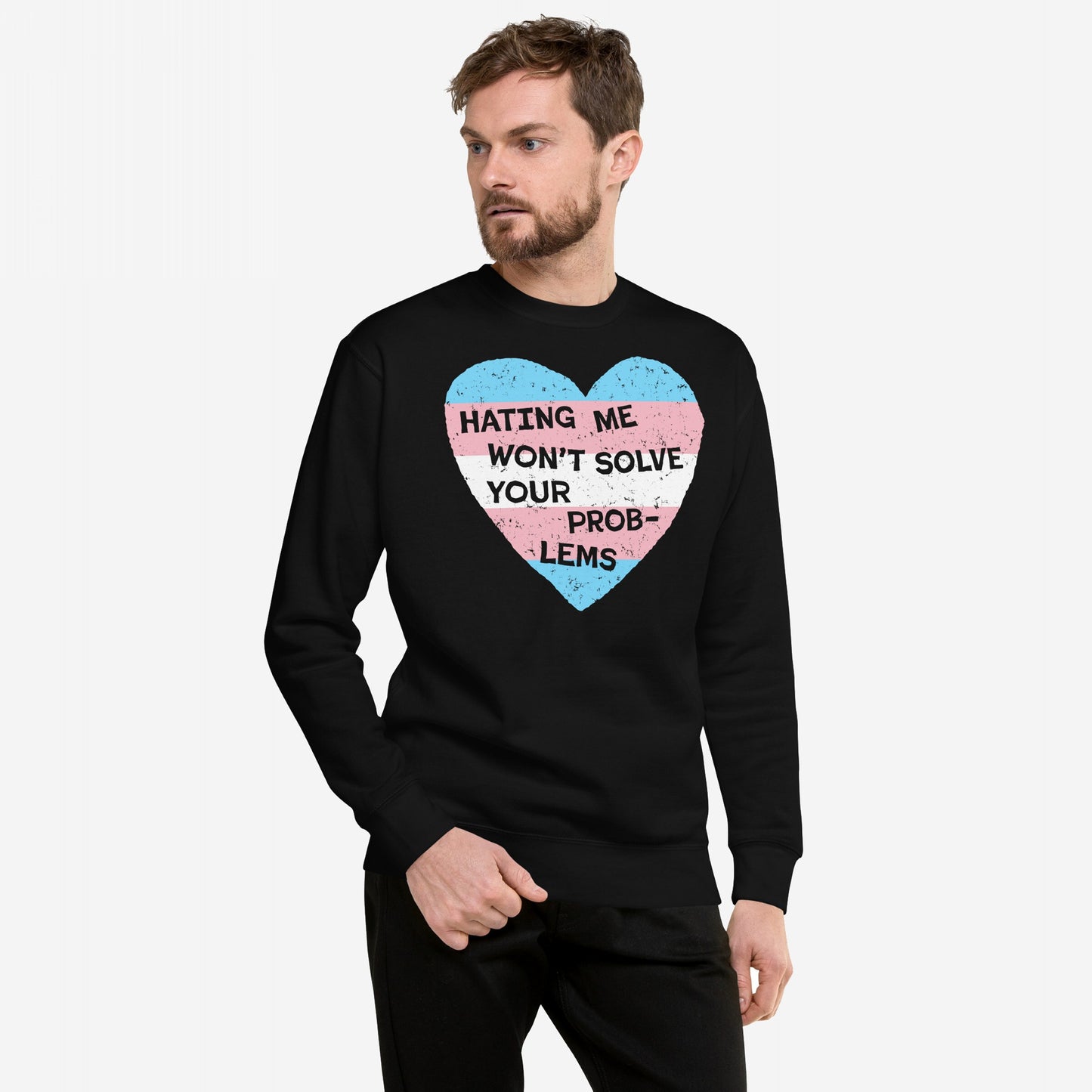 Person wearing the No Trans Hate Hoodie & Sweatshirt, featuring a trans pride heart graphic and the message HATING ME WON’T SOLVE YOUR PROB-LEMS in bold, promoting resilience and solidarity.