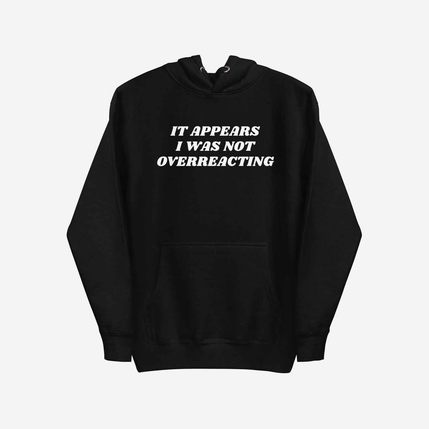 Overreacting Hoodie & Sweatshirt features bold white text asserting IT APPEARS I WAS NOT OVERREACTING, on a black pullover, embodying resistance and truth against oppression. Perfect for those challenging systemic injustices.