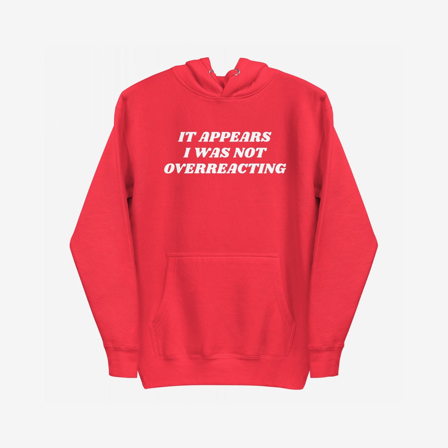 Overreacting Hoodie & Sweatshirt features bold white lettering stating “IT APPEARS I WAS NOT OVERREACTING.”, embodying a message of resistance and unapologetic critique against oppressive systems.