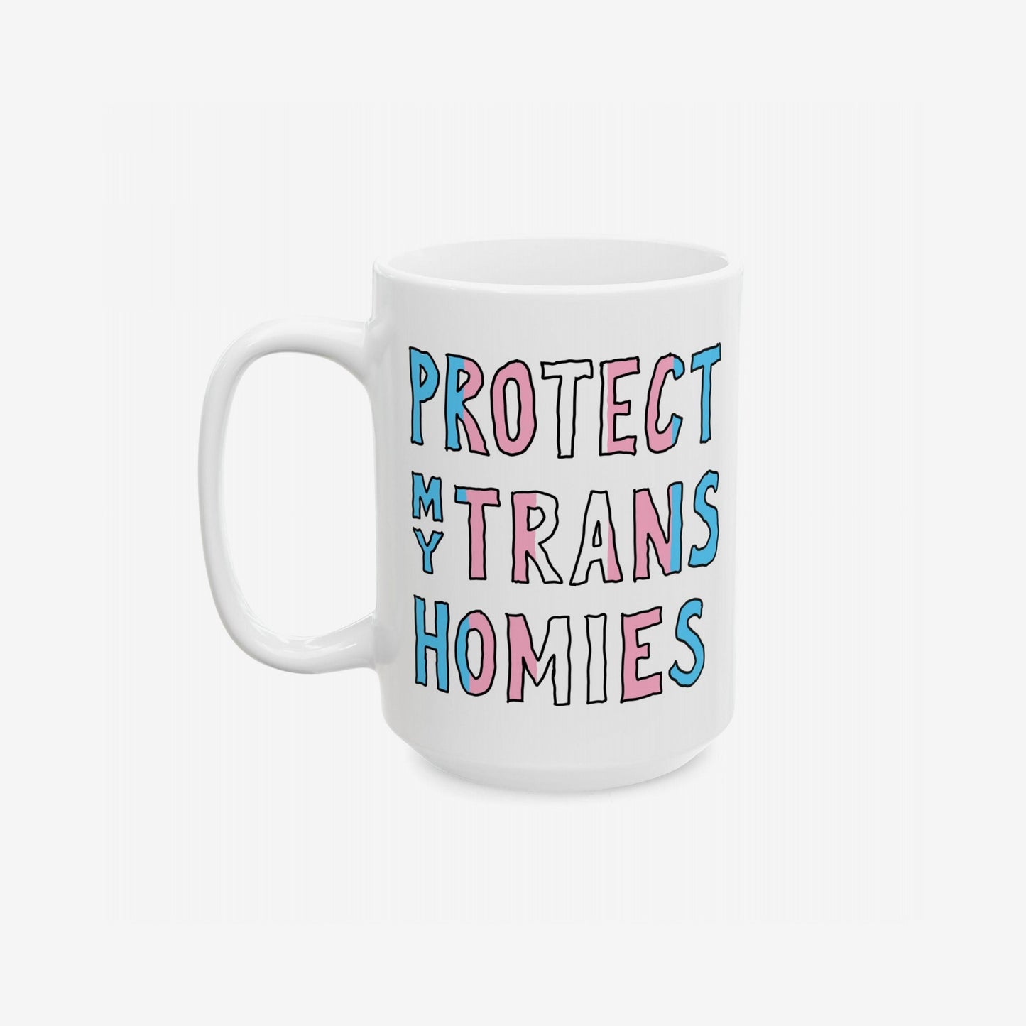 Protect My Trans Homies Mug features bold, hand-drawn lettering in transgender pride colors on a white ceramic surface, symbolizing solidarity and community. Ideal for allies and the transgender community, promoting equality with every sip.