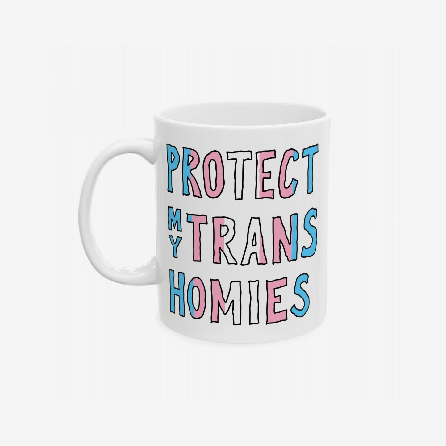 Protect My Trans Homies Mug features bold text in trans pride colors, promoting solidarity and community. This ceramic mug merges art with activism, ideal for daily use by trans individuals and allies.