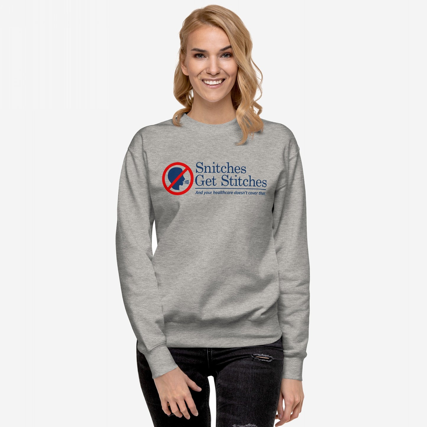 Woman in a light-gray Snitches Get Stitches Hoodie & Sweatshirt featuring a bold graphic and text critiquing snitches and healthcare. Ideal for sarcasm lovers and truth speakers.