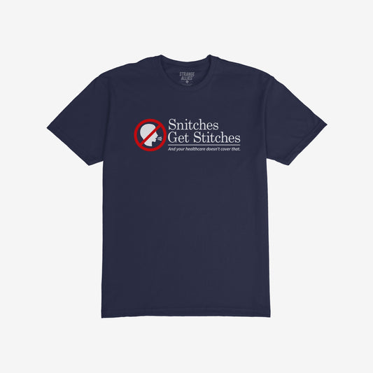 Navy-blue Snitches Get Stitches T-shirt featuring a no-snitch icon and witty slogan, humorously critiquing healthcare. STRANGE ALLIES brand above neckline, blending sarcasm with a bold message.