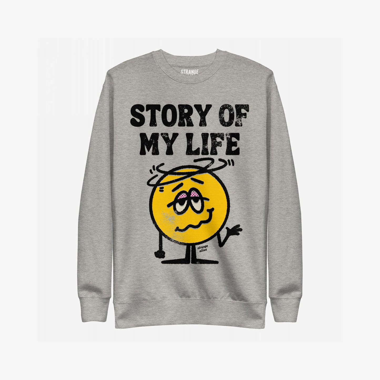 Story Of My Life Sweatshirt featuring a dazed cartoon smiley with droopy eyelids and shrugging arms under bold text, capturing a humorous take on life's mishaps.