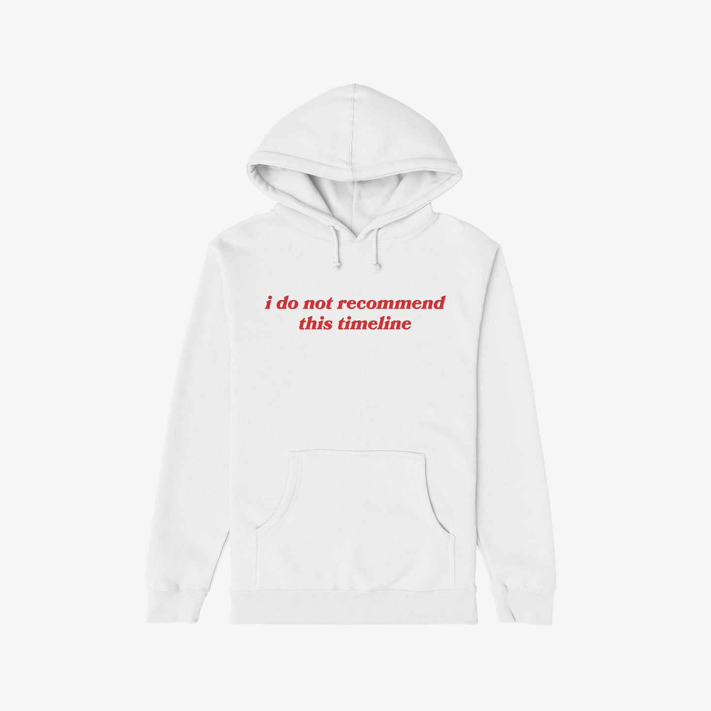 Plain white Timeline Shirt hoodie with red serif text stating “i do not recommend this timeline,” capturing humor and critique, reflecting disillusionment and vintage flair. Features kangaroo pocket and drawstring hood.