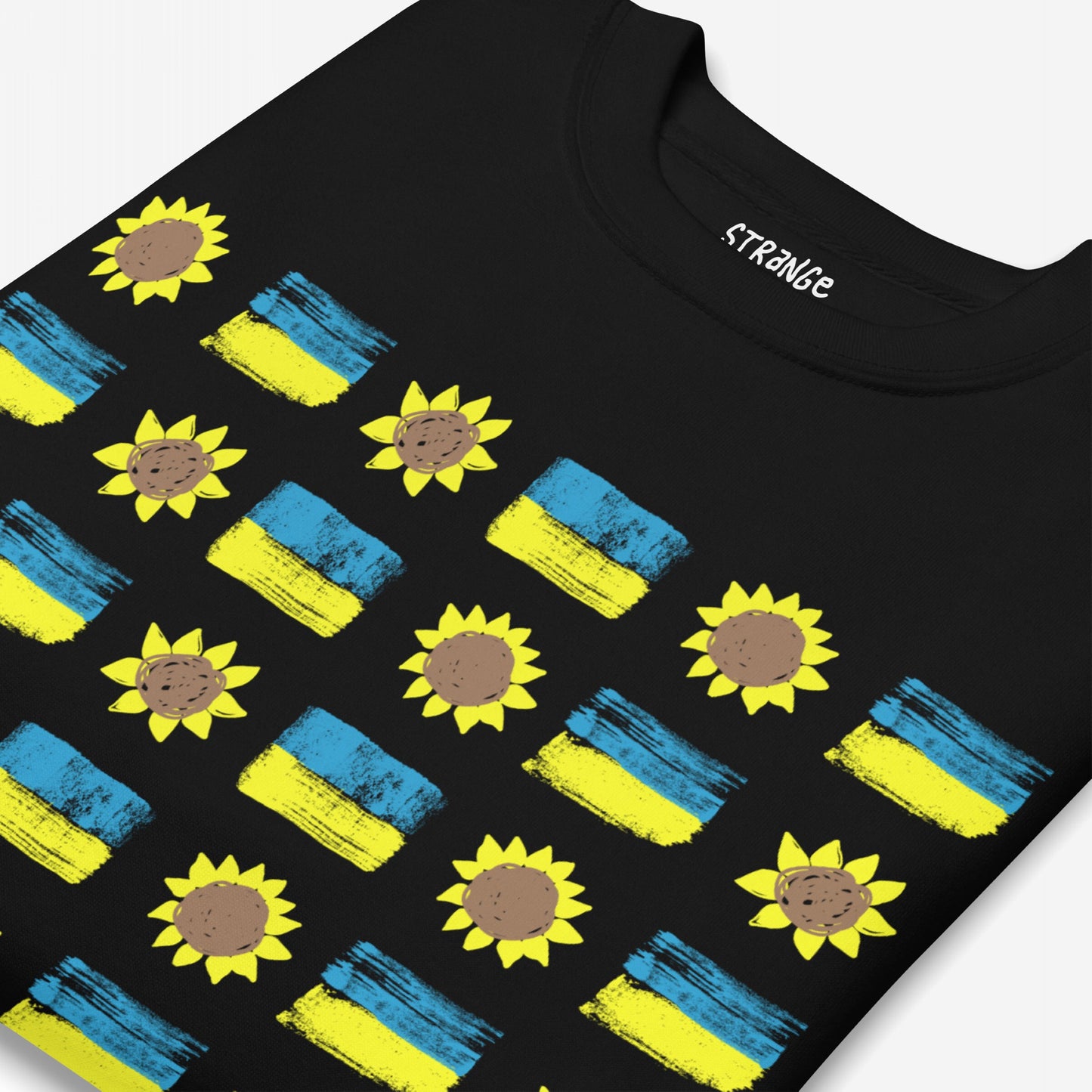 Ukraine Sunflowers Sweatshirt featuring a close-up of vibrant sunflowers and blue brush-stroke blocks pattern, symbolizing unity and courage. The STRANGE label is visible inside the collar.