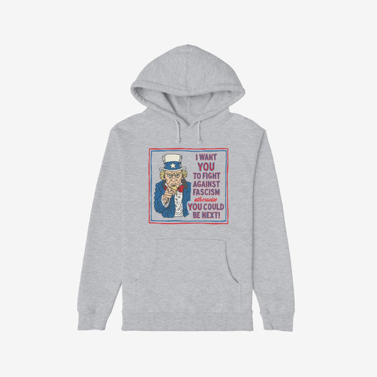 Light-gray pullover hoodie featuring the Anti Fascist Uncle Sam Shirt design, with Uncle Sam pointing and text urging resistance against fascism. A bold statement piece supporting activism and equality.