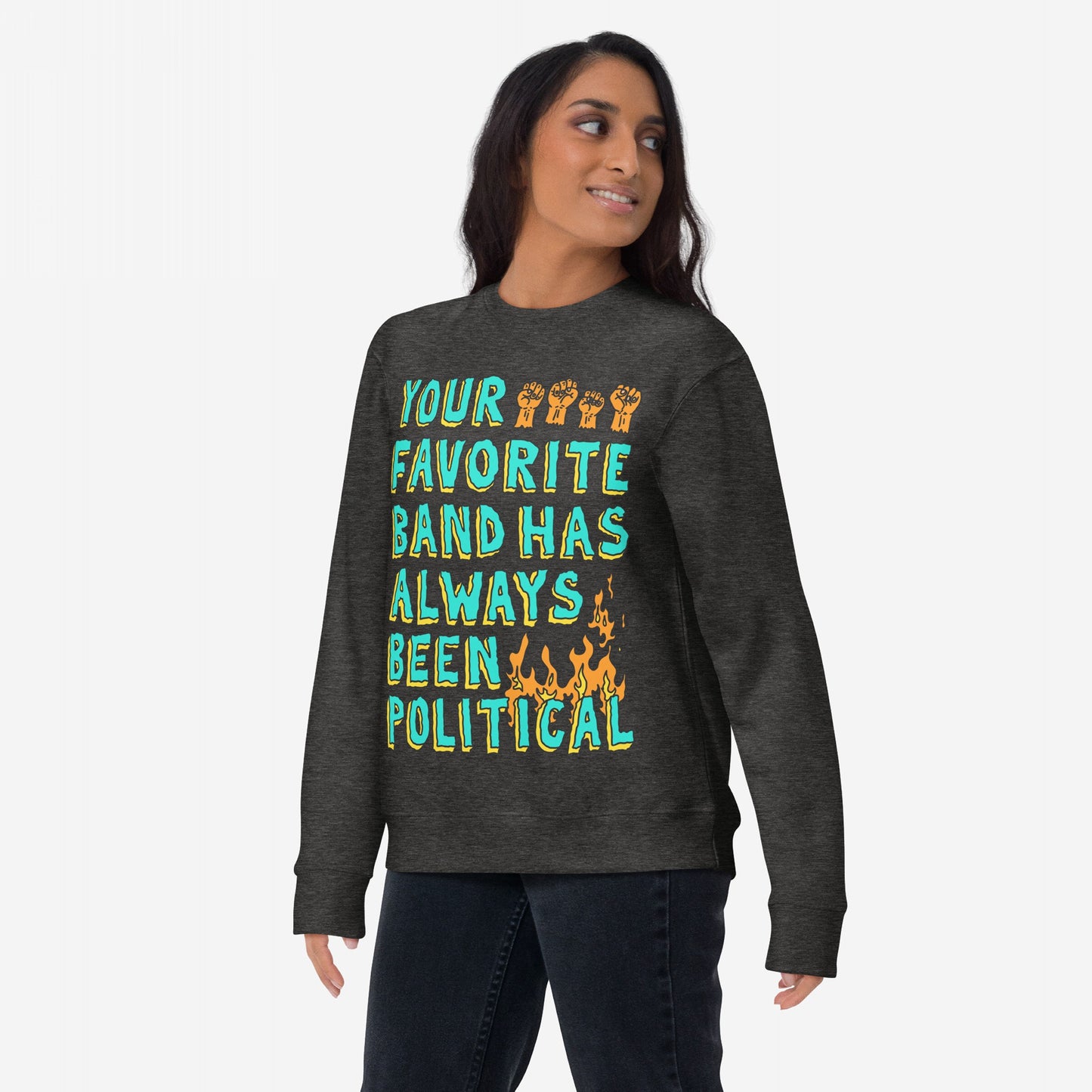 Model wearing Your Favorite Band Has Always Been Political crewneck sweatshirt, featuring a bold slogan with raised-fist icons and flames, embodying a message of activism and musical rebellion.