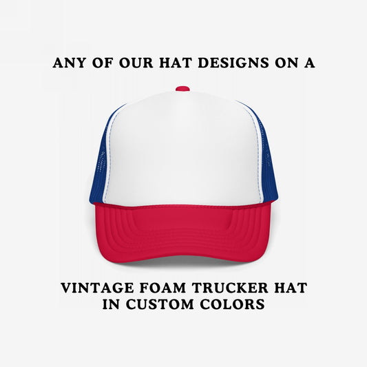 Foam Trucker Hat In Custom Colors featuring a red bill, white foam front, and blue mesh panels. Customize with anti-fascist or anti-racist designs, perfect for showcasing your values with vintage style.
