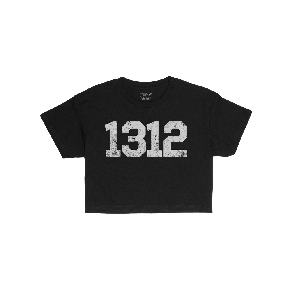 1312 ACAB Women's Baby Tee featuring a black short-sleeve design with stacked 1312 in distressed red, white, and blue. Perfec