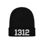 Black ribbed knit beanie hat, labeled 1312 ACAB Hat, with white 1312 numerals on the cuff, symbolizing protest against police