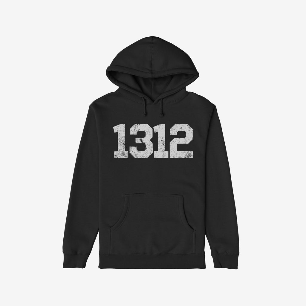 1312 ACAB Hoodie: Black pullover with kangaroo pocket, featuring a large distressed white 1312 print on the chest. Ideal for protests and activism, embodying a bold statement against oppression.