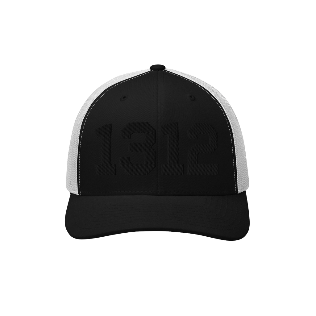 Black-and-white trucker cap with 1312 embroidered in black on the front, symbolizing ACAB. The cap features black front panel