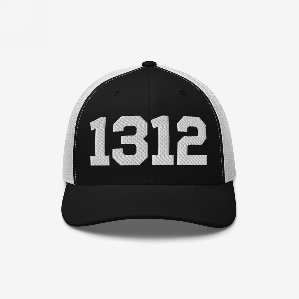 1312 ACAB Hat in black-and-white trucker style, featuring bold white 1312 on the front, symbolizing protest and advocacy for police accountability, against a neutral light-gray background.