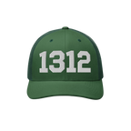 Green trucker-style cap with mesh back featuring bold white 1312 block numbers, representing ACAB, highlighting a stance agai