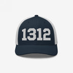 1312 ACAB Hat featuring bold white numerals on a navy front panel with a white mesh back, embodying a message of police accountability and resistance. Ideal for making a statement in various styles.