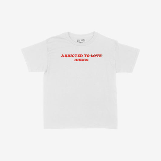 Addicted To Love / Drugs Women's Baby Tee, featuring a bold statement with LOVE struck through in red, embodies candid self-expression and humor. Perfect for those embracing authenticity and societal critique.