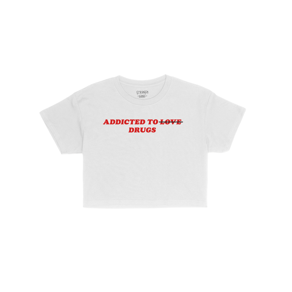 Addicted To Love / Drugs Women's Baby Tee, featuring a bold statement with LOVE struck through in red, embodies candid self-e