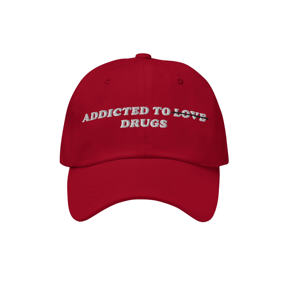 Red embroidered Addicted To Love / Drugs Hat with "Love" crossed out and replaced by "Drugs" in bold retro design.