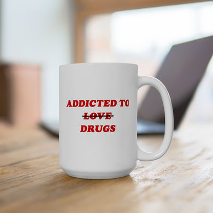 White ceramic mug on wooden tabletop, featuring bold red text: ADDICTED TO ~LOVE~ DRUGS. Perfect for expressing mental health humor and resilience. Ships from the EU, supports Amnesty International.