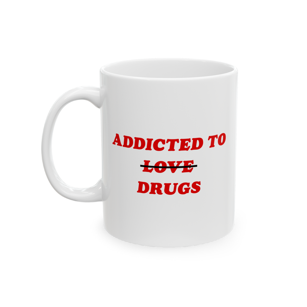 White ceramic mug with red text "Addicted to Drugs" crossed out over "Love," titled Addicted To Love / Drugs Mug.