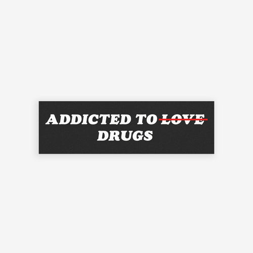 Addicted To Love / Drugs Sticker & Magnet featuring bold text with Love crossed out, available as durable vinyl sticker or magnet.