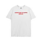 White t-shirt with bold red text "Addicted To Drugs," crossing out "Love," Addicted To Love / Drugs Shirt design.