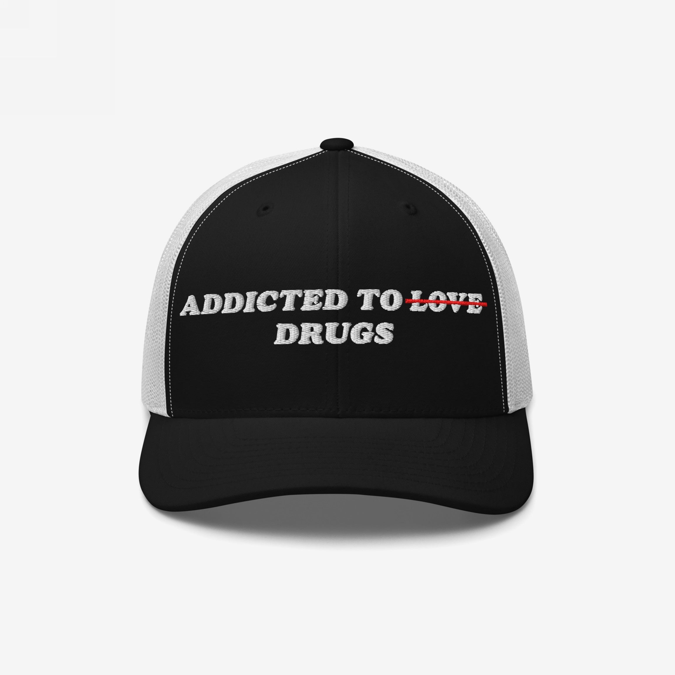 Black and white snapback hat with embroidered text "Addicted to Drugs" crossing out "Love," called Addicted To Love / Drugs Hat.