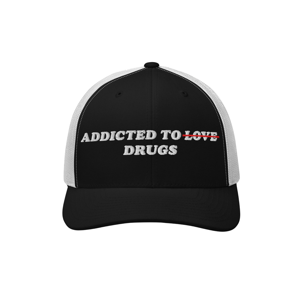 Black and white snapback hat with embroidered text "Addicted to Drugs" crossing out "Love," called Addicted To Love / Drugs H