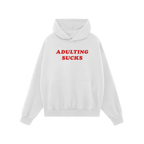 White hoodie featuring bold red ADULTING SUCKS print, perfect for expressing humor and relatable sentiments. Ideal for casual