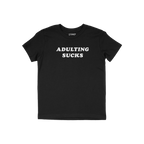 Black short-sleeve Adulting Sucks Shirt with bold white lettering, humorously expressing the challenges of adulthood. Ideal f
