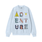 The Adventure Life Sweatshirt features a light-blue crewneck with ADVENTURE illustrated in camping motifs like tents and moun