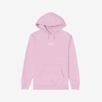 Light pink Alcohol Infused Hoodie with drawstring hood, ribbed cuffs, and kangaroo pocket, featuring ALCOHOL INFUSED. text on chest, embodying bold, unapologetic style for confident, expressive individuals.
