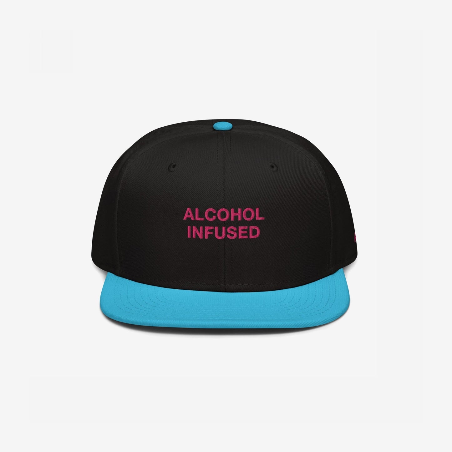 Alcohol Infused Hat: A bold snapback with 'ALCOHOL INFUSED' in magenta on a black crown, featuring a turquoise flat brim, reflecting a playful, rebellious spirit.