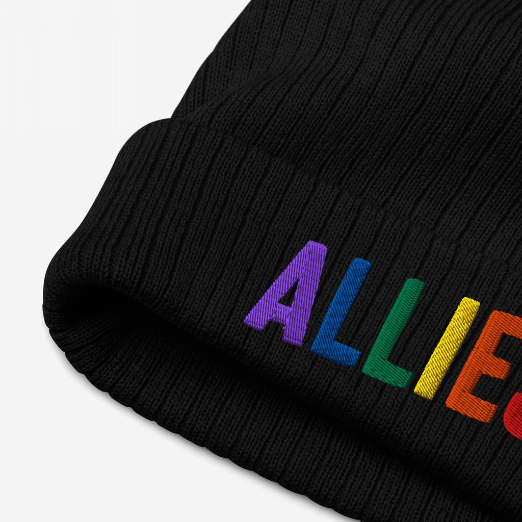 Black ribbed knit beanie featuring rainbow-embroidered ALLIES, showcasing support for LGBTQ+ rights. A bold accessory for those advocating for equality and love.