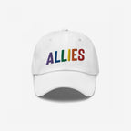 White baseball-style cap featuring “ALLIES” in rainbow embroidery, symbolizing support for LGBTQ+ rights. The Allies Rainbow Hat reflects a bold statement of equality and solidarity, perfect for everyday wear.