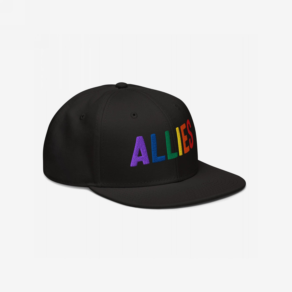 The Allies Rainbow Hat features ALLIES in vibrant rainbow embroidery on a black, flat-bill snapback, symbolizing LGBTQ+ solidarity and pride. Perfect for advocates showcasing support and equality.