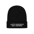 Black rib-knit beanie with ANTI-FASCISM IS SELF-DEFENSE embroidered on the cuff, embodying the Anti Fascism Is Self Defense H