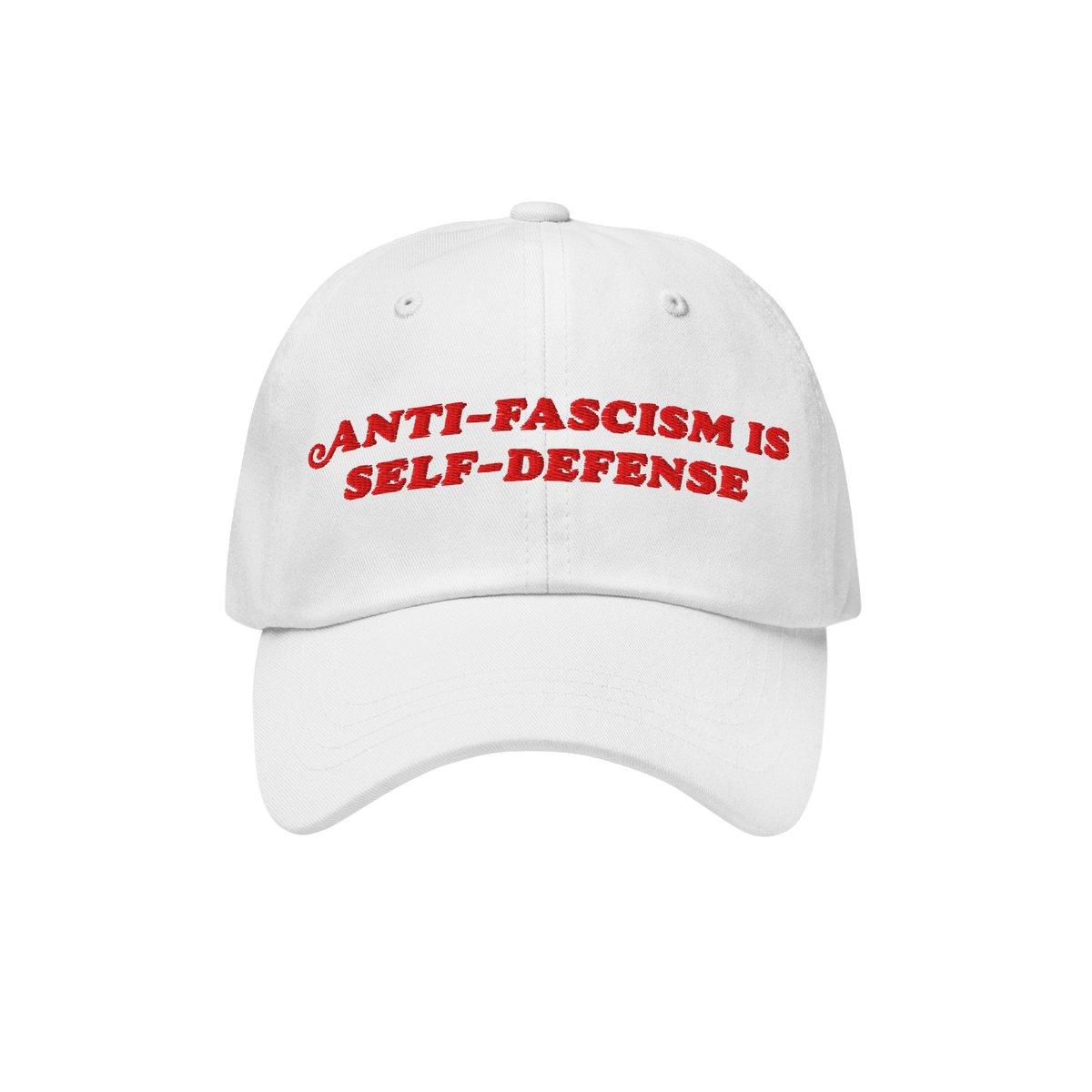 White unstructured baseball cap with bold red embroidery stating “ANTI-FASCISM IS SELF-DEFENSE.” Ideal for activists and 