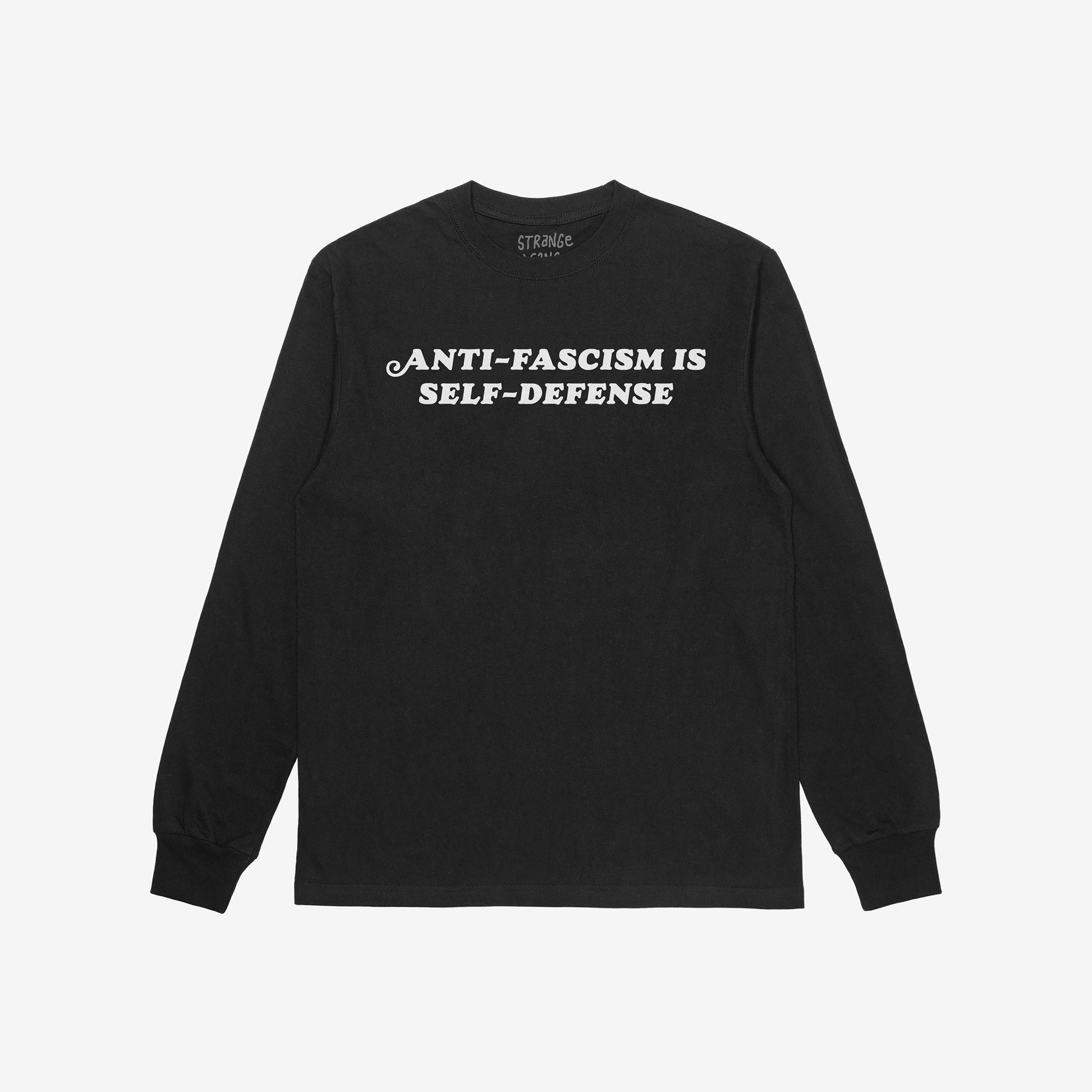 Black long-sleeve Anti-Fascism Is Self-Defense T-shirt with bold white text across the chest. Features ribbed cuffs and a crew neckline, embodying resistance and historical stance.