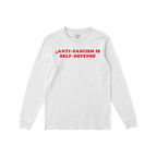 White long-sleeve T-shirt featuring bold red ANTI-FASCISM IS SELF-DEFENSE text, embodying a statement for justice and resista