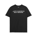 The Anti Fascism Is Self Defense Shirt displays a bold slogan in white on a black crew-neck T-shirt, embodying activism and r