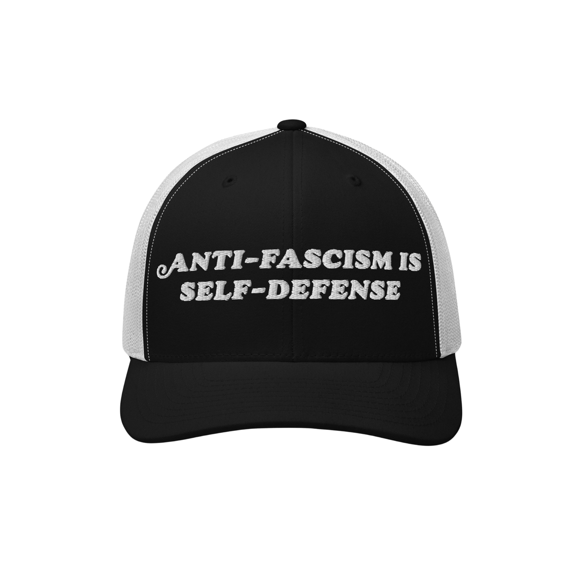 Two-tone trucker-style baseball cap with embroidered slogan “ANTI-FASCISM IS SELF-DEFENSE” on the front, embodying activi